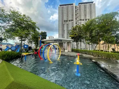 a water park in a city with a water slide at Le Cozy Cabin - 2B2R SeaCity View Infinity Pool in George Town