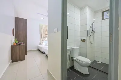 a bathroom with a toilet and a sink at Top 3 Homestay Palas Horizon Brinchang Cameron Highland -C Home Luxury A-3-18 in Brinchang