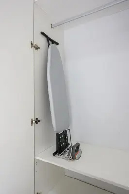 a white cabinet with a white towel hanging on it at Top 3 Homestay Palas Horizon Brinchang Cameron Highland -C Home Luxury A-3-18 in Brinchang