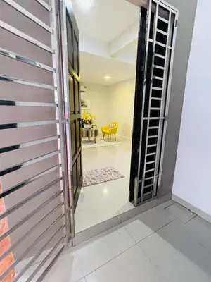 an open door to a living room with a table at The Grand Crystal Retreat 4-Bedroom Luxury Villa in Taiping