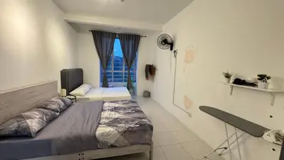 a hospital room with two beds and a window at DADDY HOMES 4 EMERALD AVENUE CENTRUM Brinchang View in Brinchang
