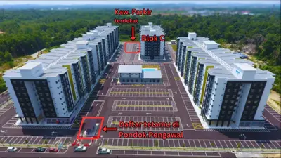 an aerial view of a large building with a red arrow at Seri Homestay Apartment Seri Iskandar in Seri Iskandar
