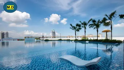 a swimming pool with a white object in the water at Marvel Nest- 3bedroom-Poolview-10pax in Bukit Mertajam