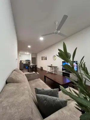 a living room with a couch and a table at Shahiqa Palas Horizon Residence in Cameron Highlands