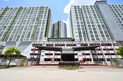 a large building with two large tall buildings at Mahkota Valley Suites Kuantan by Iconique in Gua Sai