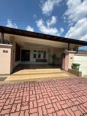a house with a brick driveway in front of it at KK Homestay Ipoh in Ipoh