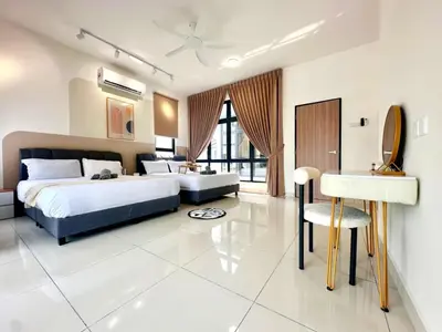 a bedroom with a bed and a desk and a sink at Modern Stylish 4BR Family House I Machang Bubuk in Bukit Mertajam