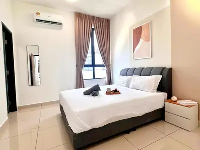 a bedroom with a large bed and a window at Modern Stylish 4BR Family House I Machang Bubuk in Bukit Mertajam