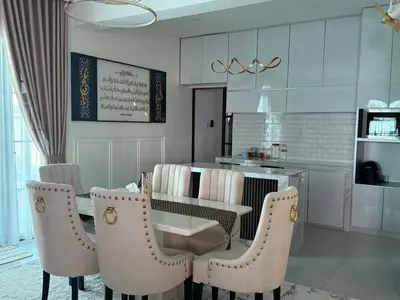 a dining room with a table and chairs at Villa SRC in Sungai Petani