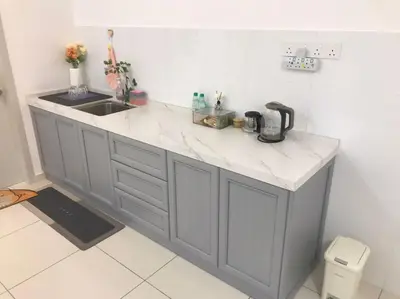 a kitchen with a counter top and a sink at Horizon Skyline Loft in Ipoh