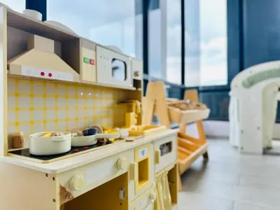 a toy kitchen with a counter with dishes on it at Breathtaking Sea View Penang Bridge 2BR in Bayan Lepas