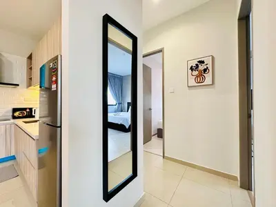 a mirror on a wall in a kitchen at Romantic Sea & Penang Bridge View Luxury 2BR in Bayan Lepas