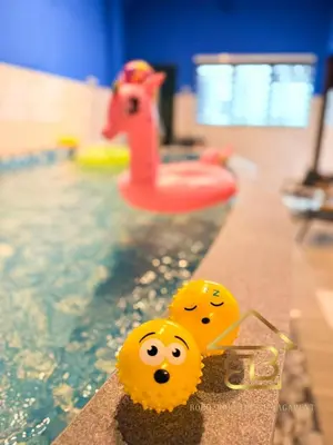 two yellow toy octopuses in a swimming pool at Ipoh Indoor Pool Homestay, BBQ Mahjong, 16 pax 4BR in Ipoh