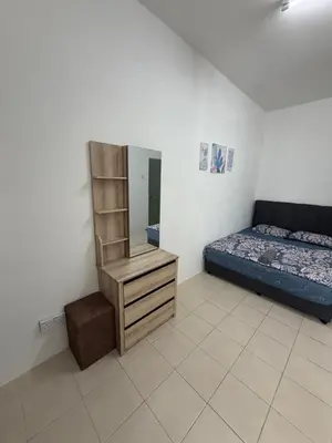 a bedroom with a bed and a dresser and a mirror at AYAAN GAMING ARENA at Tanah Rata Cameron Highland in Tanah Rata