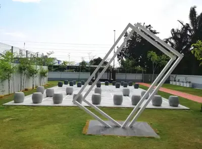 a sculpture in a field of grass at Peace HomestayThe Venus Sitiawan in Sitiawan