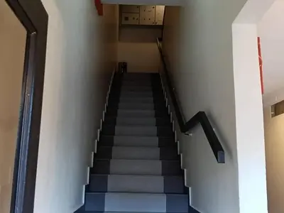 a staircase in a building with a stair case at Hotel Remix 2 Cameron Highlands in Gua Sai