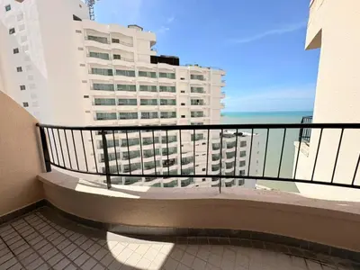 a balcony with a view of a large building at Penang Rainbow Paradise in Tanjung Bungah