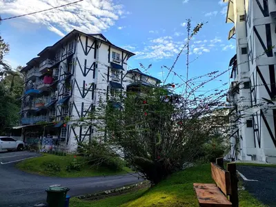 a building on the side of a street at PAS Homstay CH 2026 in Tanah Rata