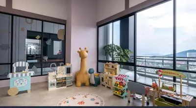 a room with large windows and a room with a giraffe at Wanderlust Retreat 1R by Iconic Regency in Bayan Lepas