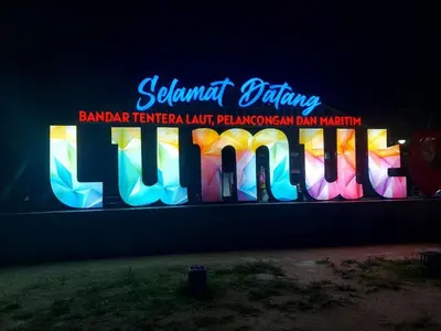 a sign for a barari tengar tengari limit malayalam at Naryan Homestay Teluk Batik in Lumut