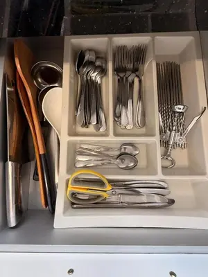 a drawer filled with utensils in a drawer at The Nest Retreat, B7-3A-1 2BR Family Suite in Bukit Fraser