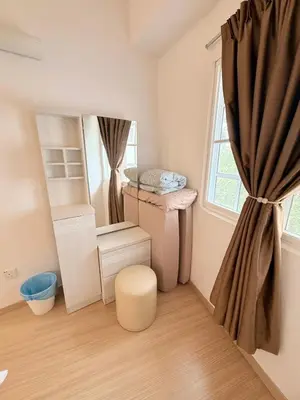 a small room with a large window and curtains at The Nest Retreat, B7-3A-1 2BR Family Suite in Bukit Fraser