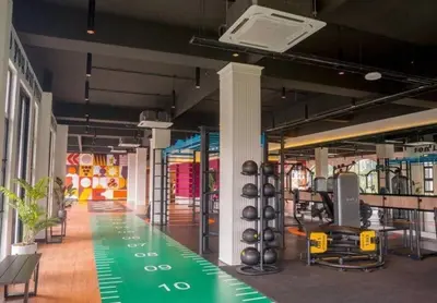 a gym with a green floor in a building at Seri Ipoh in Ipoh