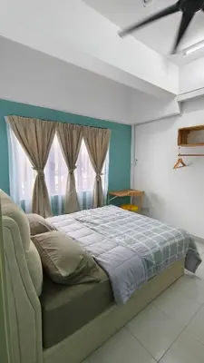 a bedroom with a large bed with a window at Hygge Living Kampar III Near UTAR in Kampar