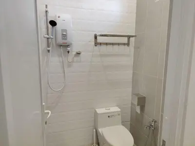 a small bathroom with a toilet and a shower at Jed Lifestyle Studio in Kepala Batas