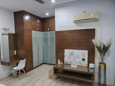 a living room with a desk and a chair at Jed Lifestyle Studio in Kepala Batas