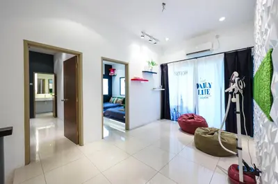a room with a hallway with two beds at 32 cozy stay Projector, Karaoke , BBQ, 7 carpark in Ipoh
