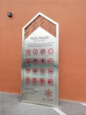 a sign in front of a wall withbidden at IPOH Piccadilly Cozy unit with City View in Ipoh