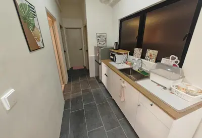 a kitchen with a sink and a counter top at IPOH Piccadilly Cozy unit with City View in Ipoh