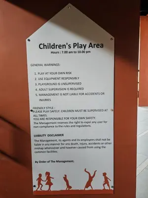 a sign for a childrens play area on a wall at IPOH Piccadilly Cozy unit with City View in Ipoh