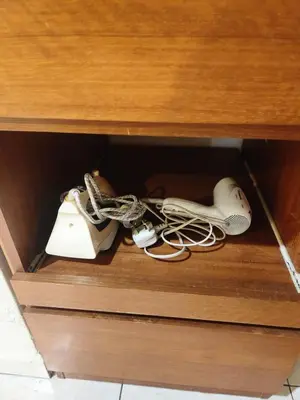 a drawer with a bunch of cords and controllers at Ipoh sunway lostworld 5br 15pax in Tambun