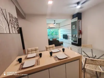 a dining room with a table and chairs at Sky Garden Luxury Family Stay in Ipoh
