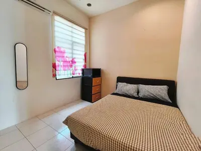 a bedroom with a bed and a window at ipoh botani 4br12pax pets friendly muji luxe in Ipoh