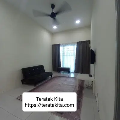 a living room with a couch and a table at Homestay Teratak Kita in Behrang Hulu