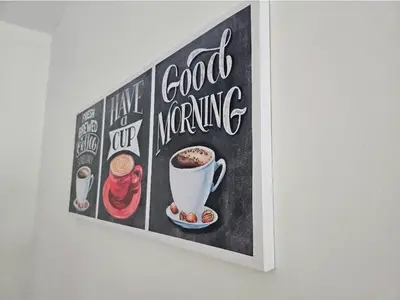 a picture of a cup of coffee on a chalkboard at Teluk Intan Bajet Homestay Landed 3Bedrooms in Teluk Intan
