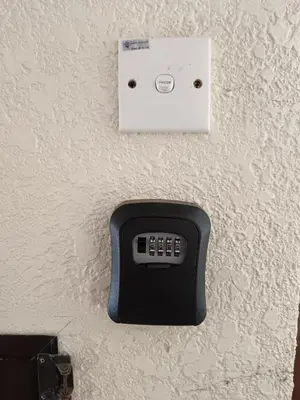 a telephone on a wall with a white socket at Homestay Cameron Highlands at Copthorne in Brinchang