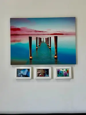 a painting of a pier on a wall at By The Sea partial seaview 2BR 6pax Batu Ferringhi in Batu Ferringhi