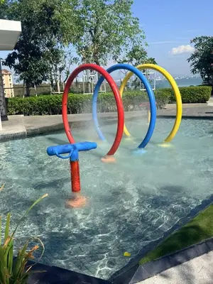a water park with colorful rings in the water at Urban Suites, Penang in George Town