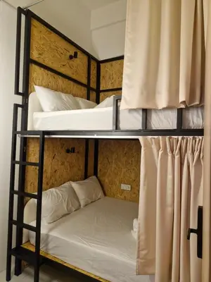 a couple of bunk beds in a room at Amore Stay by BNB4U in George Town