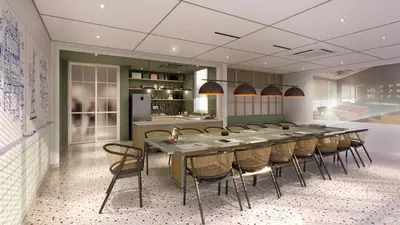 a large dining room with a long table and chairs at Stallionz Leisure Suites Ipoh in Ipoh