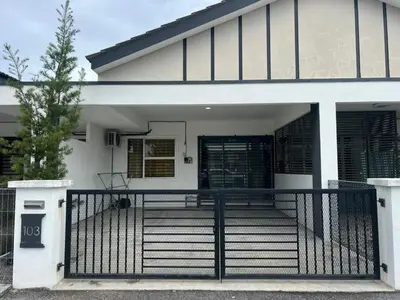a white house with a black gate and stairs at LAMAN SUZY Seri Iskandar in Seri Iskandar