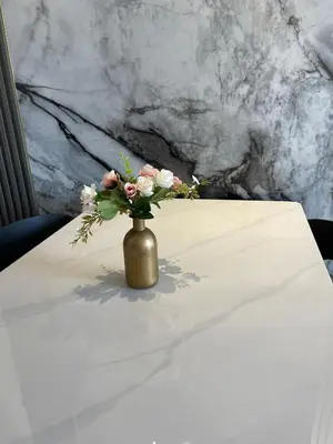 a vase of flowers sitting on a table at Piccadilly Greentown Ipoh in Ipoh