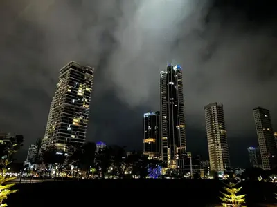 a city skyline with tall buildings at night at Elegant 3BR Luxury City View Comfortable for 10 in George Town