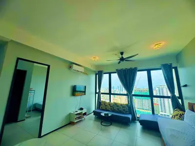 a living room with a ceiling fan and large windows at Luxury 3BRHighFloor CityView10 Pax StylishSpacious in George Town