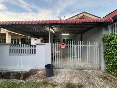a white fence in front of a house with a gate at Amiradanial Homestay in Gua Musang