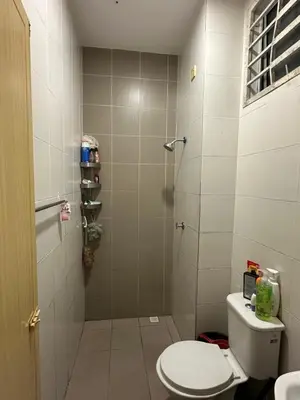a bathroom with a shower with a toilet and a sink at RSyifaris ZH Homestay DSerai Wangi